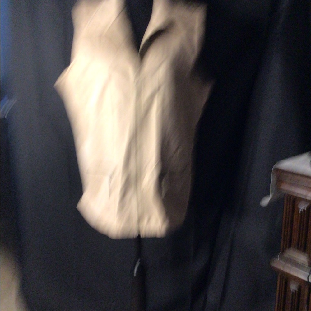 #897.   Tan Sleeveless Vest